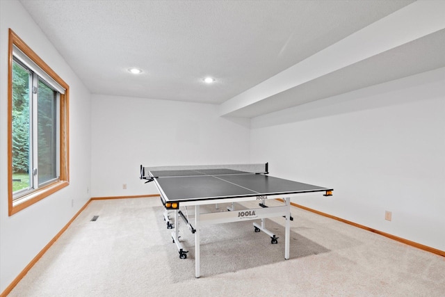 12351 Holly St NW, Coon Rapids, MN 55448 - rec room with baseboards, carpet flooring, and recessed lighting