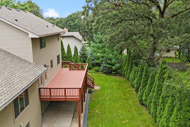 12351 Holly St NW, Coon Rapids, MN 55448 - view of green lawn with a wooden deck