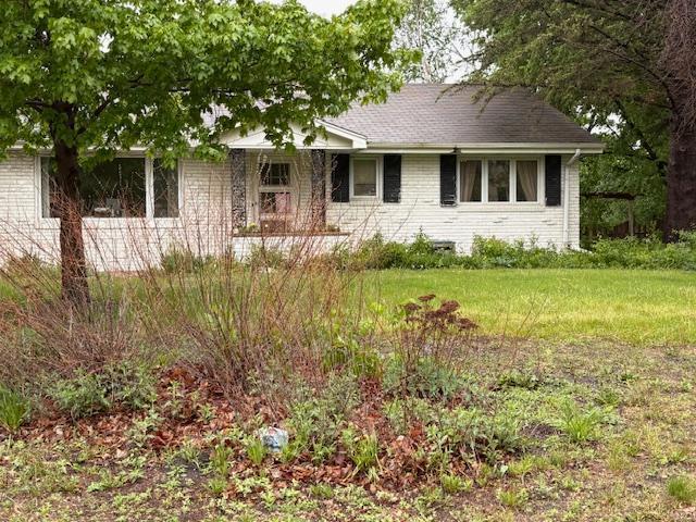 3801 Vandan Rd, Minnetonka, MN 55345 - ranch-style house featuring a front lawn and brick siding