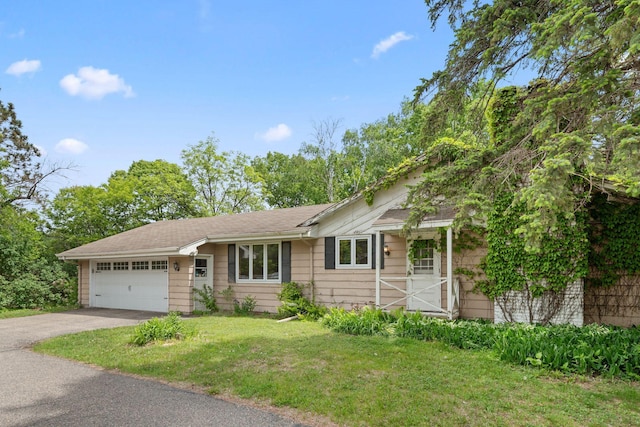 3801 Vandan Rd, Minnetonka, MN 55345 - single story home with an attached garage, asphalt driveway, and a front lawn