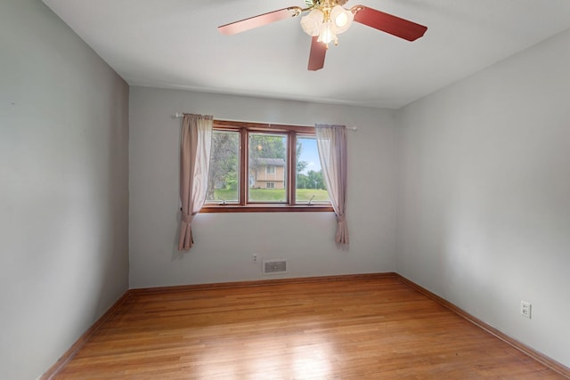 3801 Vandan Rd, Minnetonka, MN 55345 - spare room with a ceiling fan, light wood-style flooring, and baseboards