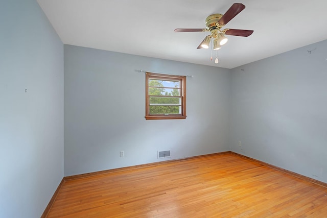 3801 Vandan Rd, Minnetonka, MN 55345 - spare room with light wood-style flooring, ceiling fan, and baseboards