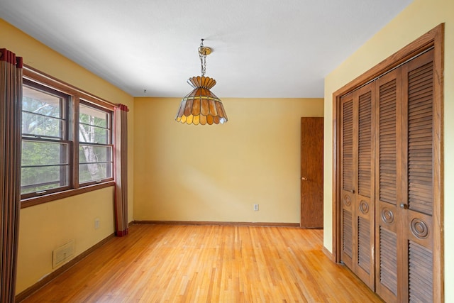 3801 Vandan Rd, Minnetonka, MN 55345 - unfurnished dining area featuring light wood-type flooring and baseboards