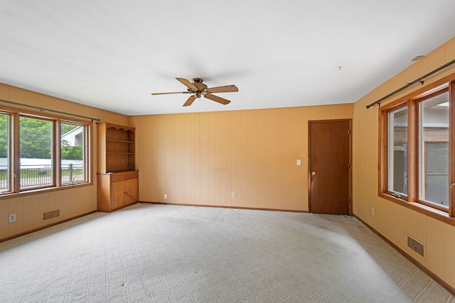 3801 Vandan Rd, Minnetonka, MN 55345 - unfurnished room with a ceiling fan, light carpet, and baseboards