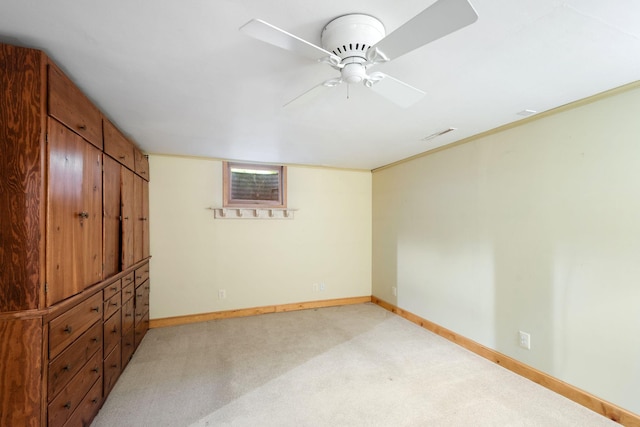 3801 Vandan Rd, Minnetonka, MN 55345 - unfurnished bedroom with light carpet, baseboards, and ceiling fan
