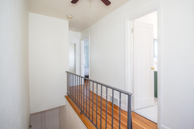 1904 Saunders Ave, Saint Paul, MN 55116 - hall featuring an upstairs landing and wood finished floors