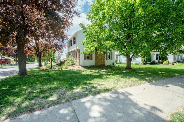 1904 Saunders Ave, Saint Paul, MN 55116 - view of front of property featuring a front lawn and stucco siding