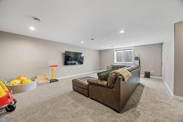 5409 47th Ave S, Fargo, ND 58104 - carpeted living area featuring baseboards and recessed lighting