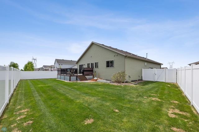 5409 47th Ave S, Fargo, ND 58104 - rear view of property with a deck and a gate