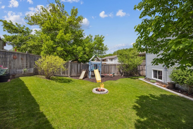 1435 104th Ln NW, Coon Rapids, MN 55433 - view of yard featuring a playground