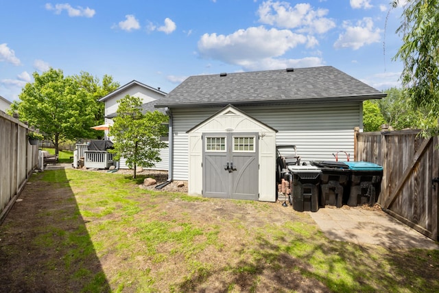 1435 104th Ln NW, Coon Rapids, MN 55433 - back of property featuring a shingled roof