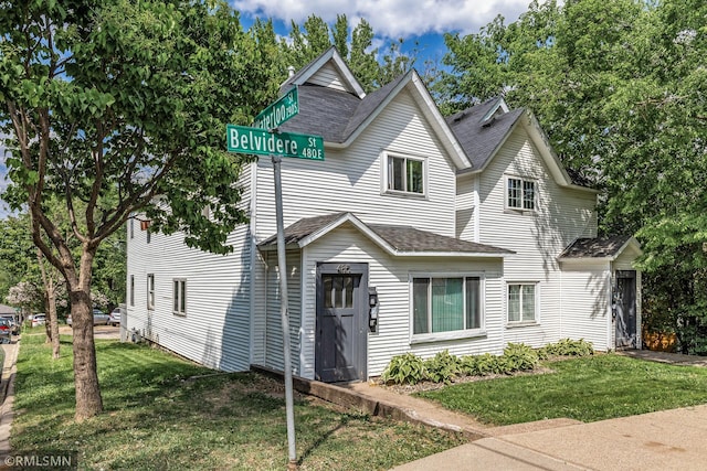 485 Belvidere St E, Saint Paul, MN 55107 - view of front of property with roof with shingles and a front lawn