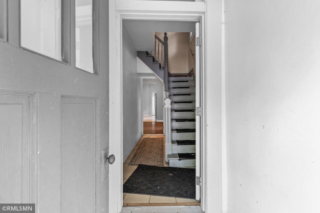485 Belvidere St E, Saint Paul, MN 55107 - stairs featuring tile patterned floors