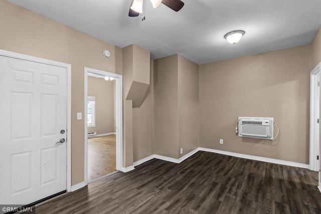 485 Belvidere St E, Saint Paul, MN 55107 - foyer with dark wood-style floors, a wall mounted air conditioner, ceiling fan, baseboards, and a baseboard radiator