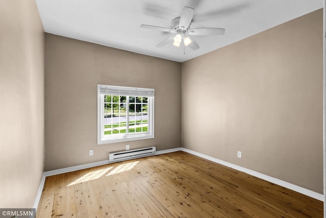 485 Belvidere St E, Saint Paul, MN 55107 - unfurnished room with baseboard heating, baseboards, hardwood / wood-style flooring, and ceiling fan