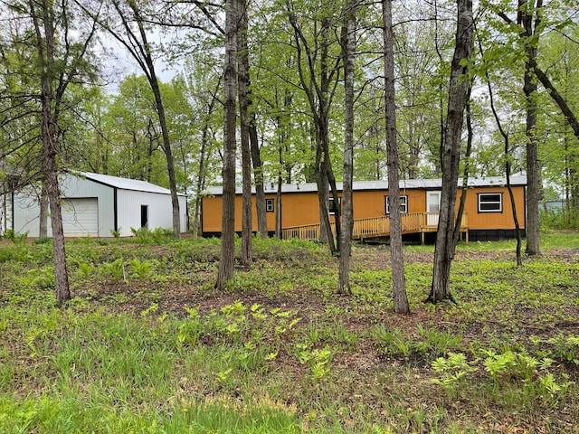 33008 Birch Ln, Motley, MN 56466 - back of house with an outdoor structure and a detached garage