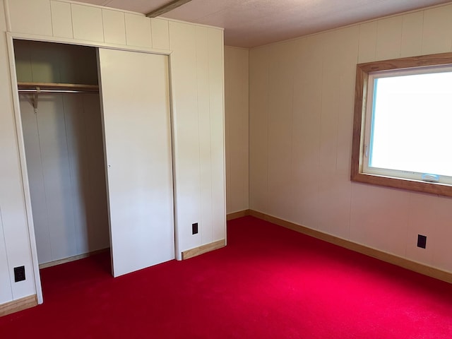 33008 Birch Ln, Motley, MN 56466 - unfurnished bedroom featuring carpet floors and a closet