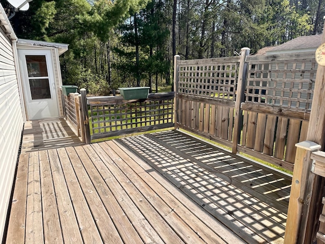 33363 Gardenview Dr, Sturgeon Lake, MN 55783 - wooden deck featuring view of scattered trees