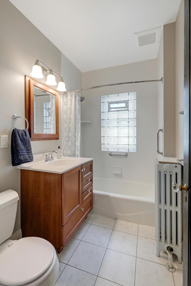 bathroom featuring radiator, toilet, shower / tub combo, vanity, and tile patterned flooring