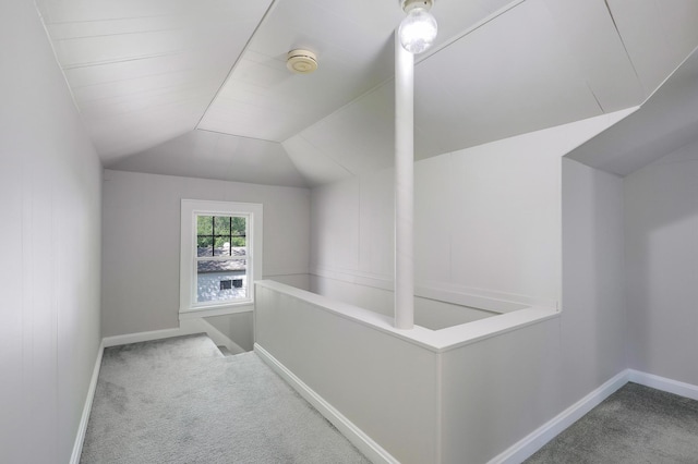bonus room with carpet flooring, baseboards, and lofted ceiling