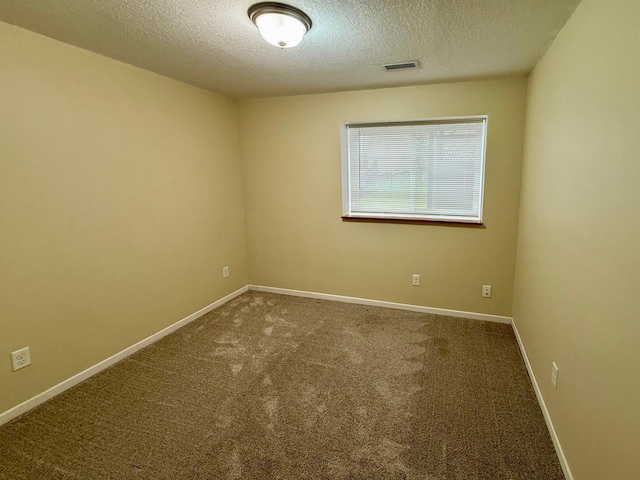 4681 Heritage Pkwy N, Hugo, MN 55038 - carpeted empty room featuring a textured ceiling and baseboards
