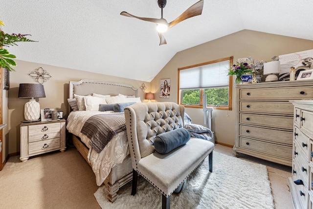 bedroom featuring lofted ceiling, light carpet, and ceiling fan