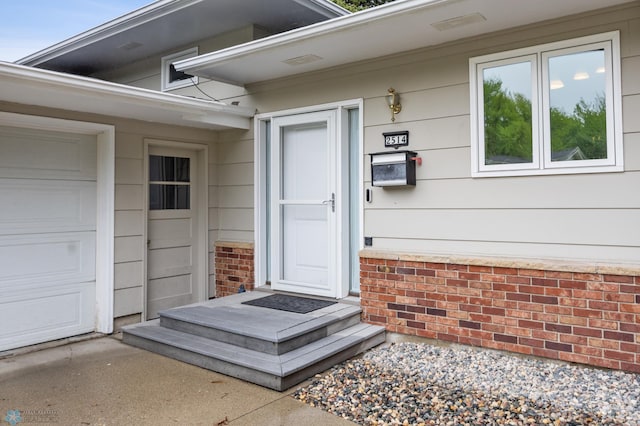 2514 Willow Rd N, Fargo, ND 58102 - view of exterior entry with a garage