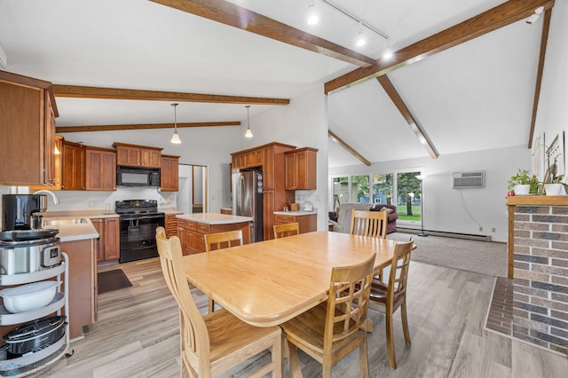 2514 Willow Rd N, Fargo, ND 58102 - dining space with a baseboard heating unit, light wood finished floors, and an AC wall unit