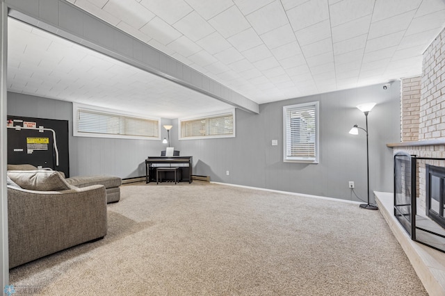 2514 Willow Rd N, Fargo, ND 58102 - living area featuring carpet flooring, a brick fireplace, and baseboard heating