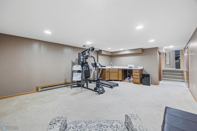 2514 Willow Rd N, Fargo, ND 58102 - workout room featuring light carpet, recessed lighting, a baseboard radiator, and baseboards