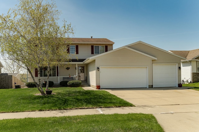 4822 3rd St NW, Rochester, MN 55901 - traditional home with a garage, a porch, and driveway