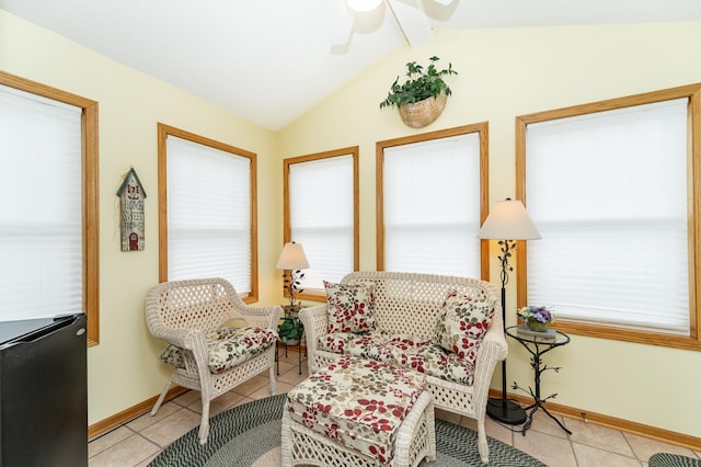 4822 3rd St NW, Rochester, MN 55901 - sitting room featuring light tile patterned floors, ceiling fan, vaulted ceiling, and baseboards