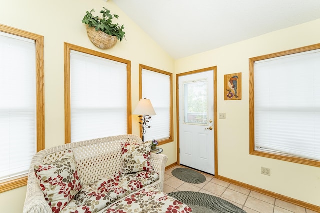 4822 3rd St NW, Rochester, MN 55901 - entrance foyer featuring light tile patterned floors, vaulted ceiling, and baseboards