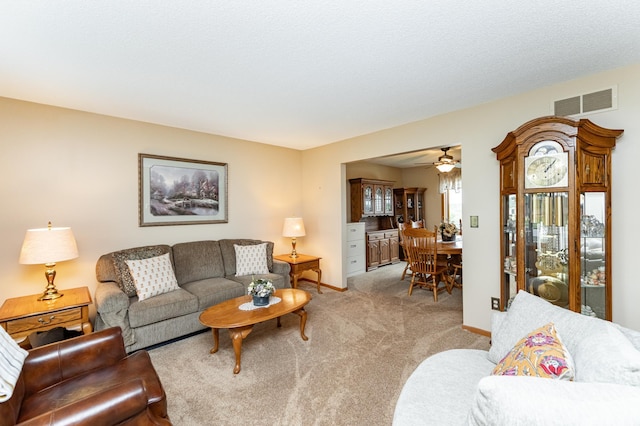 4822 3rd St NW, Rochester, MN 55901 - living room with carpet flooring, ceiling fan, and baseboards