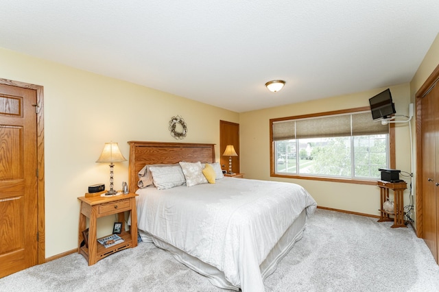 4822 3rd St NW, Rochester, MN 55901 - bedroom featuring light carpet and baseboards