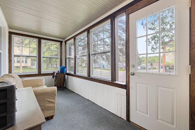 301 3rd St, Nashwauk, MN 55769 - sunroom featuring carpet and plenty of natural light