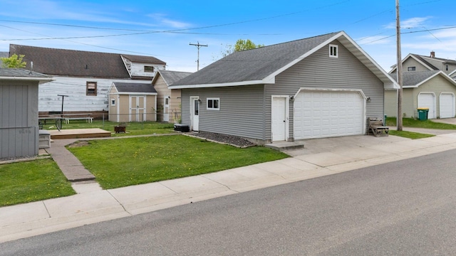 301 3rd St, Nashwauk, MN 55769 - view of front of property featuring an outbuilding and a shingled roof