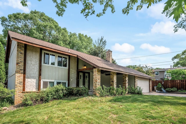 1653 Briardale Rd NE, Fridley, MN 55432 - view of front of home featuring a chimney, a garage, stone siding, and a shingled roof