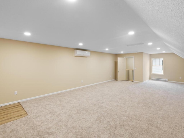 17394 Sunset Trl SW, Prior Lake, MN 55372 - basement with light colored carpet, a wall mounted air conditioner, baseboards, baseboard heating, and recessed lighting