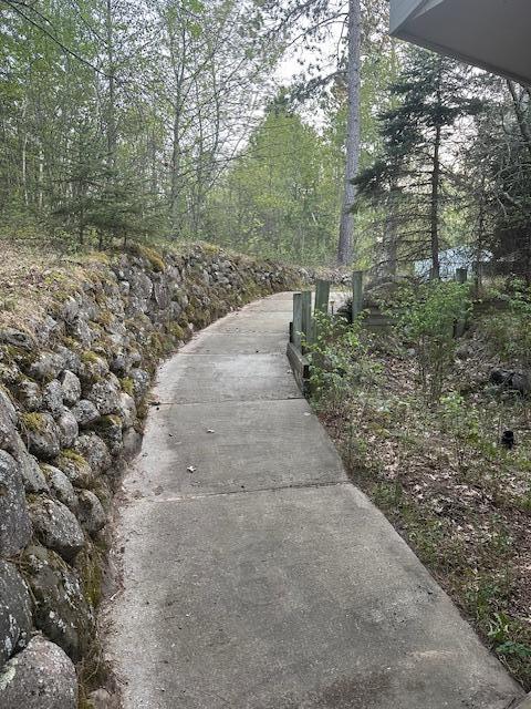 view of community with a forest view