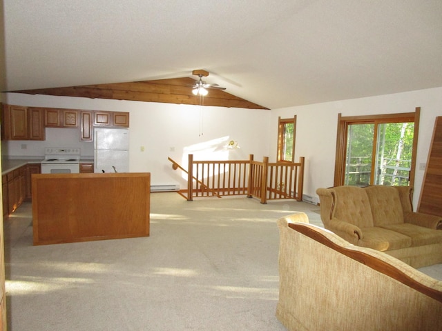 50532 County 29, Bemidji, MN 56601 - living area featuring a ceiling fan, light colored carpet, vaulted ceiling, and baseboard heating