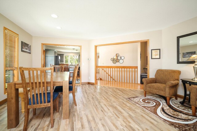 dining area featuring light wood-style floors, recessed lighting, and baseboards