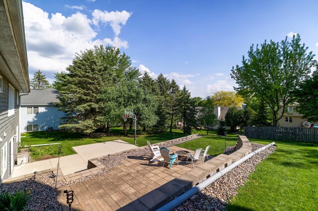view of patio / terrace featuring a fire pit