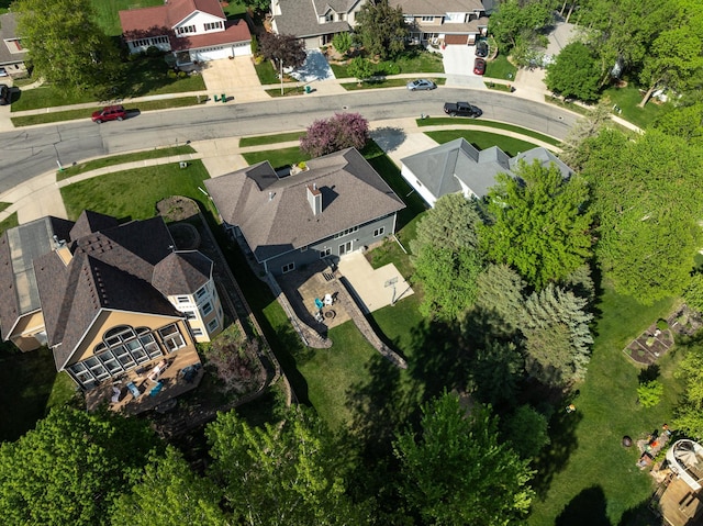 aerial view of property's location with nearby suburban area