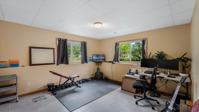833 19th Ave N, Saint Cloud, MN 56303 - tiled home office with a drop ceiling and baseboards