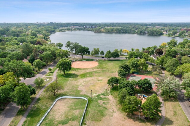 aerial view of property and surrounding area with a large body of water