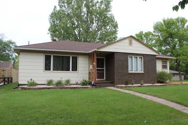 ranch-style house with brick siding