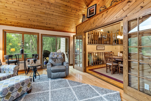 480 Suzanne Ave, Shoreview, MN 55126 - living area with healthy amount of natural light, vaulted ceiling, wood finished floors, and wooden ceiling