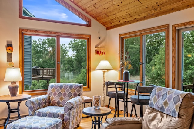 480 Suzanne Ave, Shoreview, MN 55126 - living area with lofted ceiling, wood finished floors, wood ceiling, and baseboards