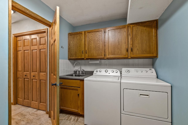 480 Suzanne Ave, Shoreview, MN 55126 - laundry area featuring cabinet space and washer and dryer